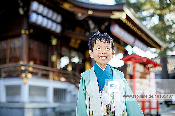 Japanese kid wearing kimono at the temple