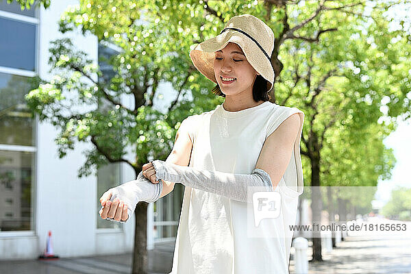 Japanese woman taking measures against UV rays