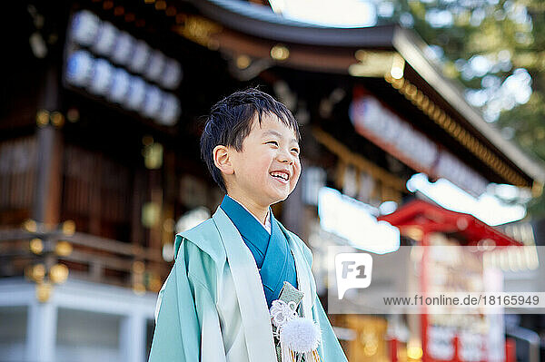 Japanese kid wearing kimono at the temple