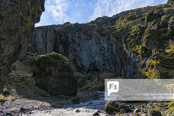 Unnamed valley in the area known as Thorsmork  Iceland with a stream flowing across the beautiful rugged landscape; South Coast  Iceland