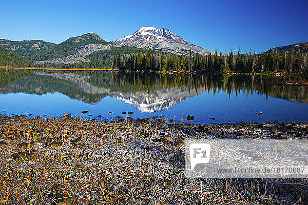 Morning frost at Sparks Lake and a view of South Sister in Three Sisters Wilderness  Oregon Cascade Mountains in the Pacific Northwest; Oregon  United States of America