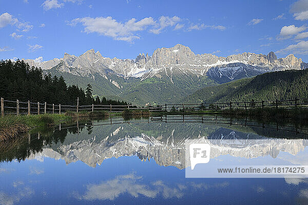 Rosengarten (Catinaccio Group) Mountains Reflecting in Lake  Kesselkogel  Vajolet Towers  Laurinswand and Rosengartenspitze  near village of Tiers  Wuhnleger Area  Trentino-Alto Adige  Dolomites  Italy