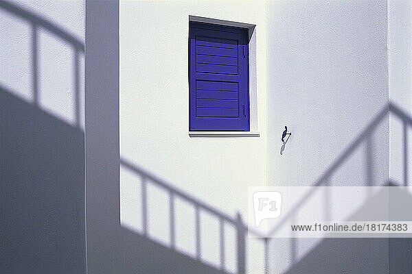 Shadow on Wall with Window and Blue Shutters  Mykonos  Greece