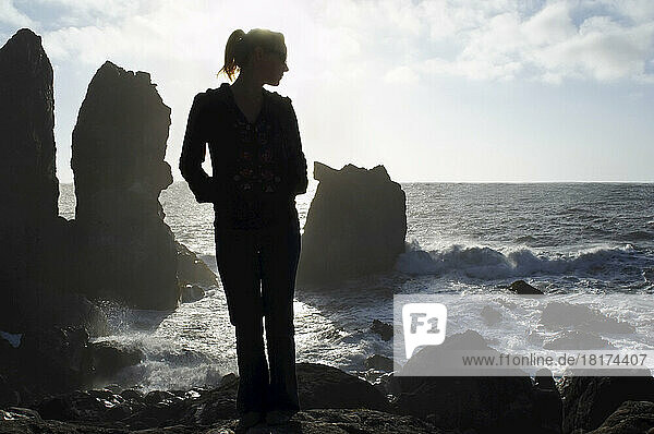 Woman Standing on Rocks at Humboldt Coast  California  USA