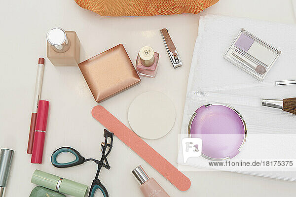 Overhead View of Bathroom Countertop with Women's Cosmetics and Beauty Products