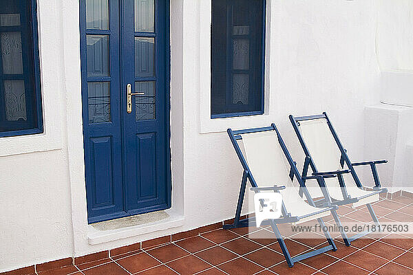 Chairs in Front of Apartment  Oia  Santorini  Cyclades Islands  Greece