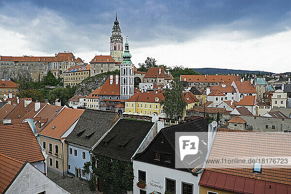 Overview of rooftops with St Jost Church tower and Cesky Krumlov Castle tower  Cesky Krumlov  Czech Republic.