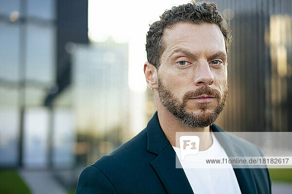Portrait of serious businessman with beard