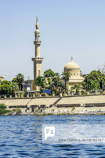 Egypt  Luxor Governorate  Luxor  Bank of Nile river with city minaret in background