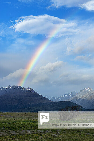 New Zealand  Canterbury Region  Scenic view of rainbow arching over Tasman Valley