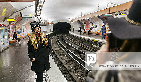 Paris  France  tourists taking picture at underground station platform