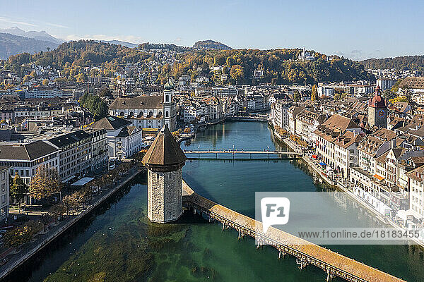 Switzerland  Canton of Lucerne  Lucerne  Aerial view of historic Chapel Bridge in autumn