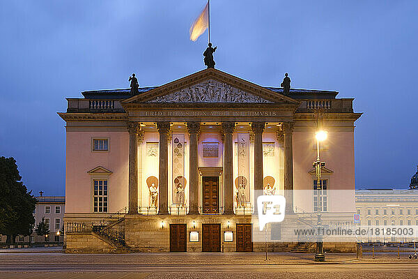 Germany  Berlin  Illuminated facade of Berlin State Opera at dusk