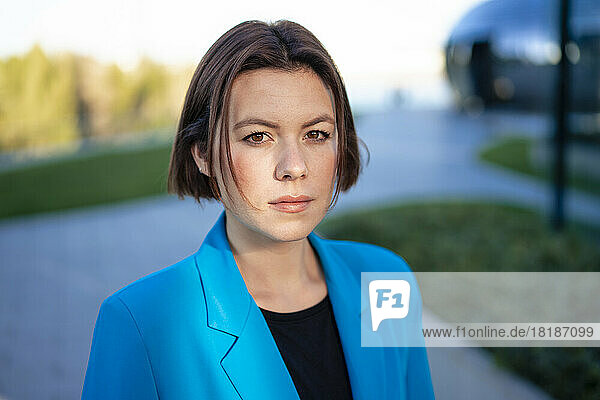 Portrait of serious young businesswoman