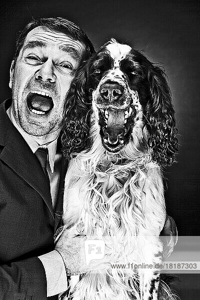 Portrait of mature man and English Springer Spaniel shouting
