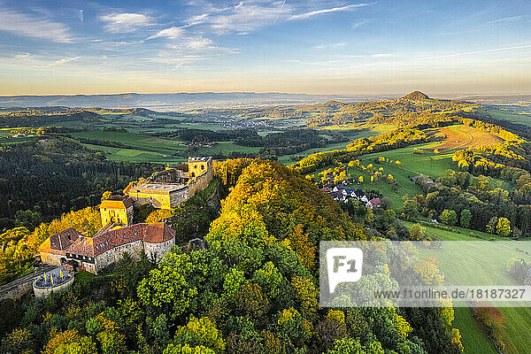 Germany  Baden-Wurttemberg  Drone view of ruined Hohenrechberg Castle at autumn dusk