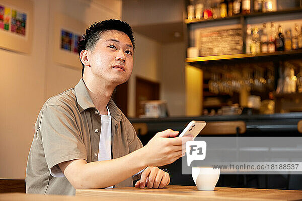 Japanese man at a cafe