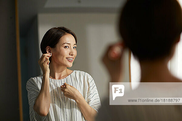 Japanese woman getting ready at home