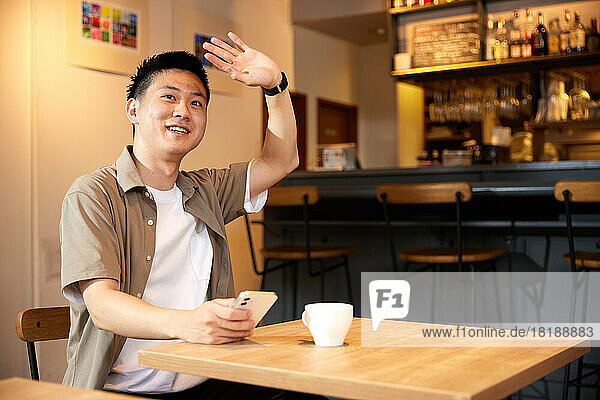 Japanese man at a cafe