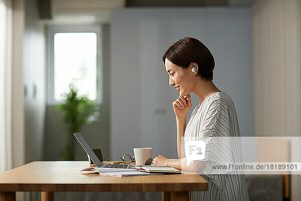 Japanese woman working at home