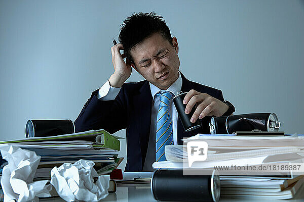 Tired Japanese businessman
