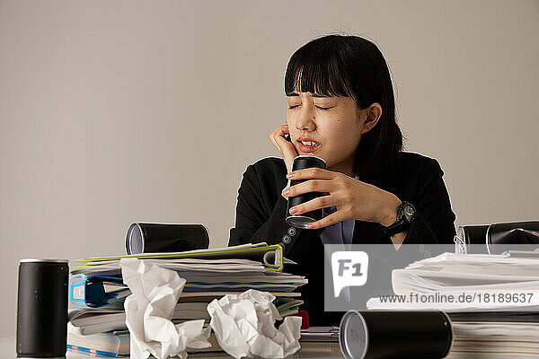 Tired Japanese businesswoman