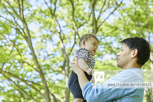 Japanese father holding baby