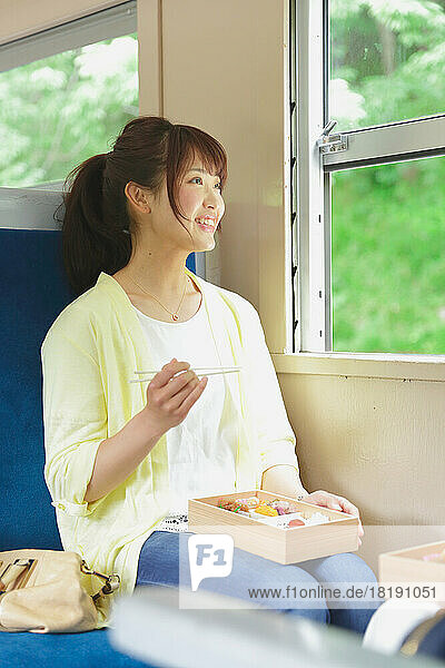 Japanese woman eating lunch box