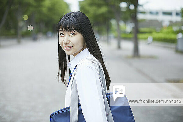 Smiling Japanese high school girl
