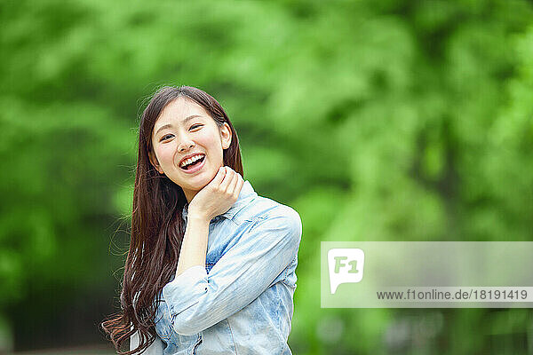 Fresh greenery and Japanese woman
