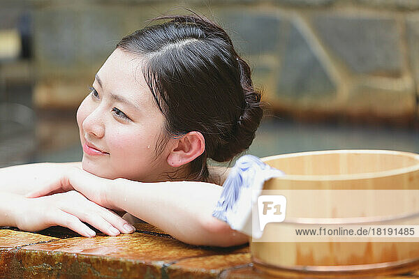 Japanese woman enjoying her hot spring trip
