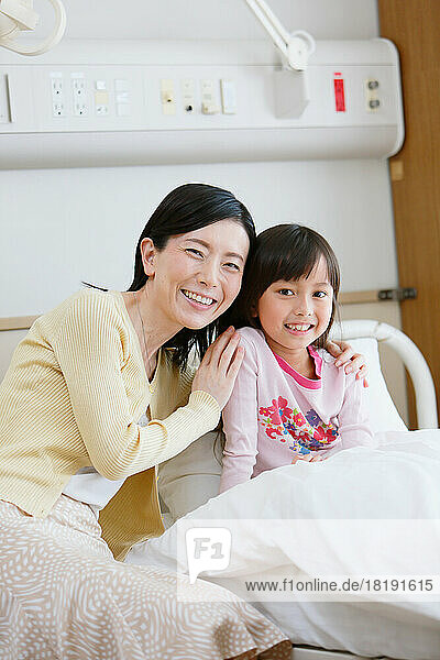 Japanese parent and child in a hospital room