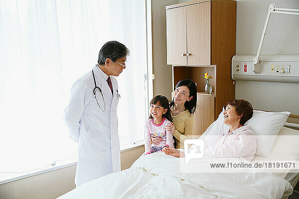 Senior woman being examined by a doctor in a hospital room