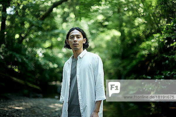 Japanese man in the forest
