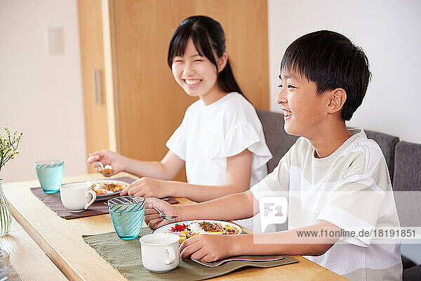 Japanese family eating at home