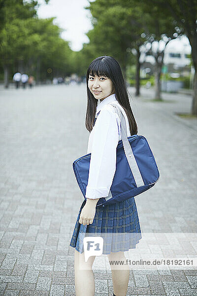 Smiling Japanese high school girl