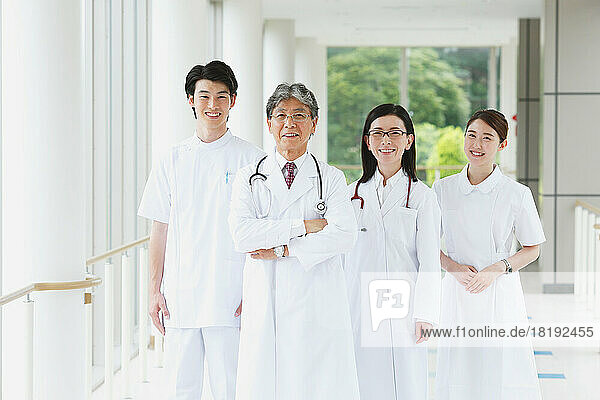 Medical team smiling in the hallway