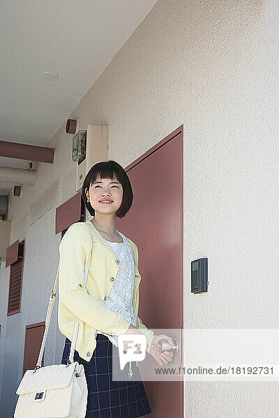 Young Japanese woman heading out