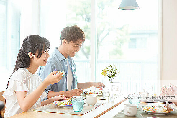 Japanese family eating at home
