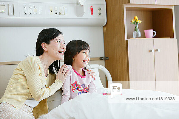 Japanese parent and child in a hospital room