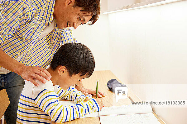 Japanese kid studying at home