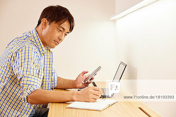 Japanese man working from home