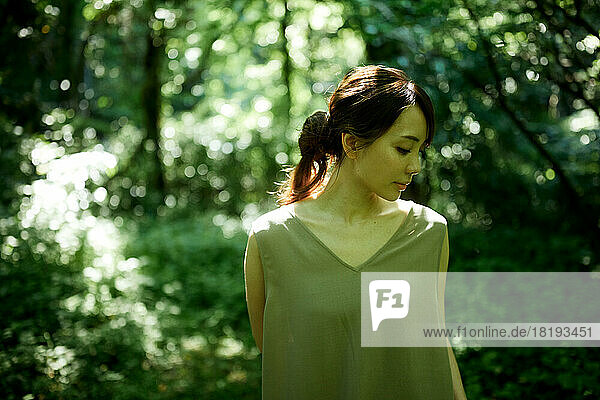 Japanese woman in the forest