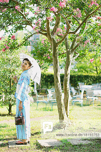 Japanese woman in a yukata with a parasol