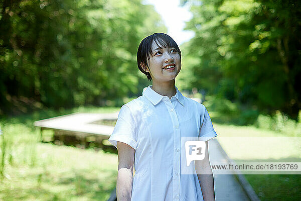 Young Japanese woman at a city park