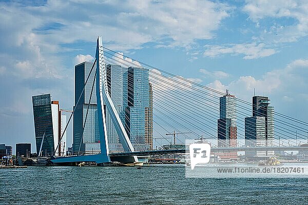 ROTTERDAM  THE NETHERLANDS  MAY 11  2017: View of Rotterdam sityscape with Erasmusbrug bridge over Nieuwe Maas and modern architecture skyscrapers