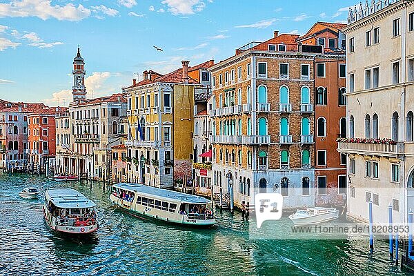VENICE  ITALY  JUNE 27  2018: Grand Canal with boats  vaporetto and gondolas on sunset from Rialto bridge  Venice  Italy  Europe