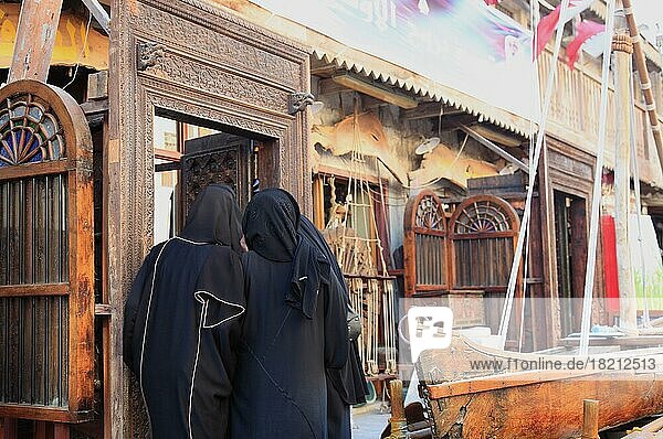 Old Town of Doha  veiled woman shopping  Qatar  Qatar  Asia
