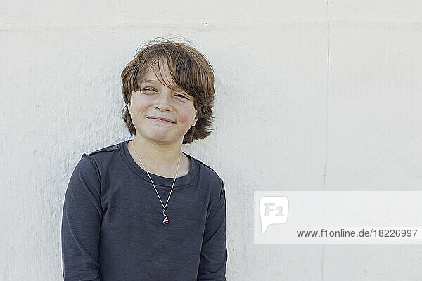 Portrait of happy boy (8-9) smiling