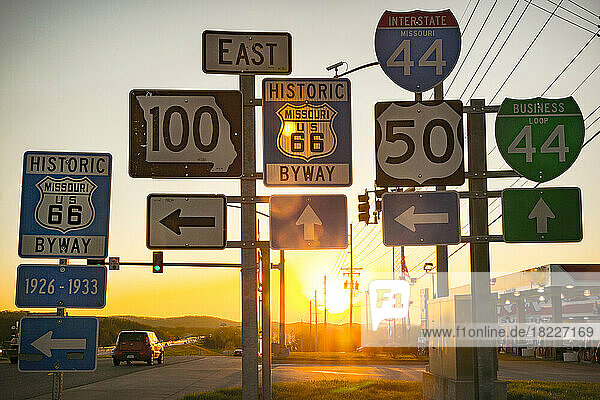 USA  Missouri  Pacific  Various old road signs at sunset